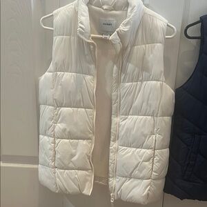 GAP Navy Puffer Vest and Old Navy white puffer vest